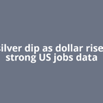 Gold, silver dip as dollar rises after strong US jobs data