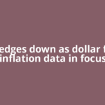 Gold edges down as dollar firms; inflation data in focus